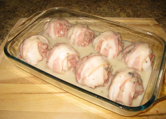 Covered bacon-wrapped beef patties